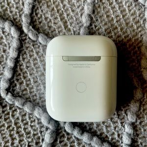 Apple 2nd Generation AirPods with charging case.